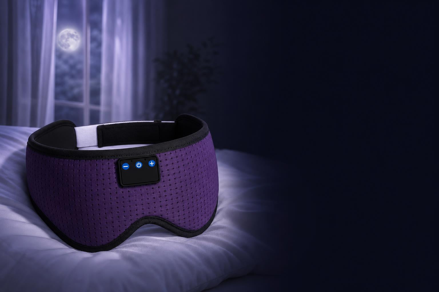 Sleep mask resting on a pillow in moonlight
